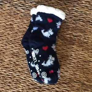 Muk Luks socks. NWOT. Navy blue w/ fuzzy dogs. Faux Sherpa. One size.